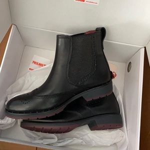 Brand new in box. They were too small for me